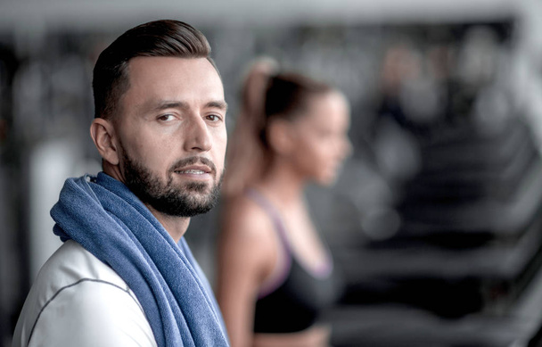 close up. modern attractive man in the gym. - 写真・画像