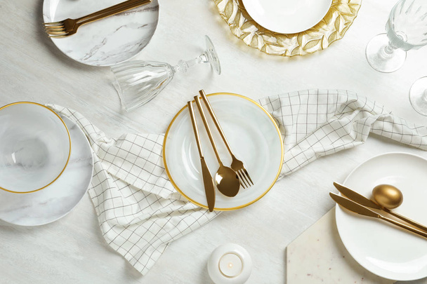 Festive Easter table setting on wooden background, top view - Foto, Imagem