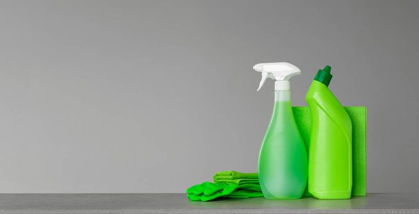 Green set for spring cleaning. Copy space, neutral background. - Photo, image