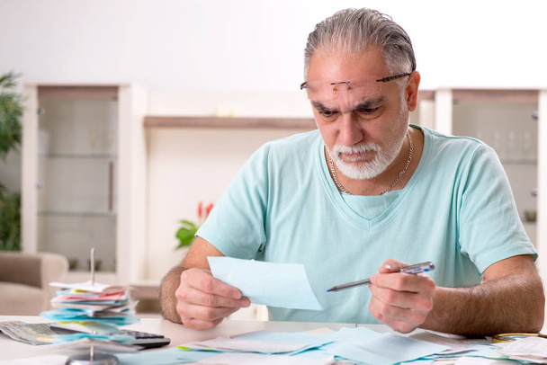 White bearded old man in budget planning concept  - Photo, Image
