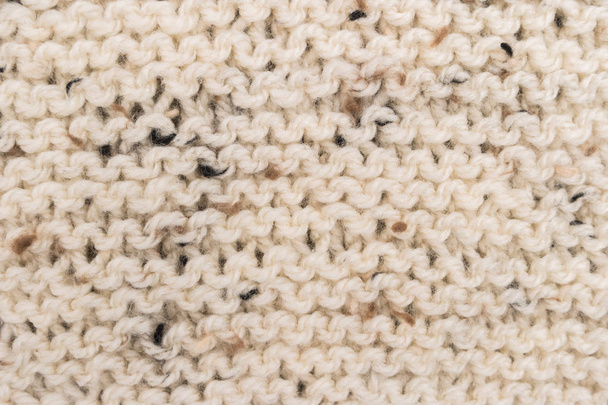 Diseño de suéter de invierno. Empieza tejiendo fondo de textura de lana. Textura de tejido de punto. Fondo de punto de punto con un patrón de relieve. Trenzas en punto
 - Foto, Imagen