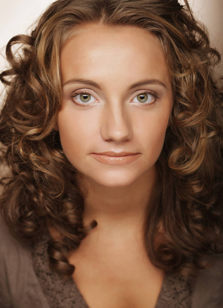 young woman with cury hair - Fotó, kép
