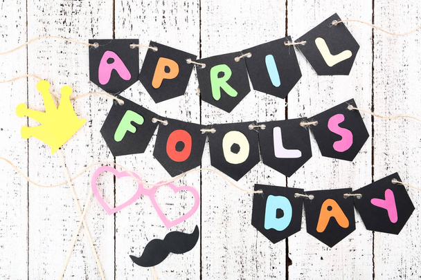Inscription April Fool's Day with paper booth props - 写真・画像