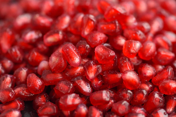 Pomegranate seeds close-up with drops water - Foto, Imagem