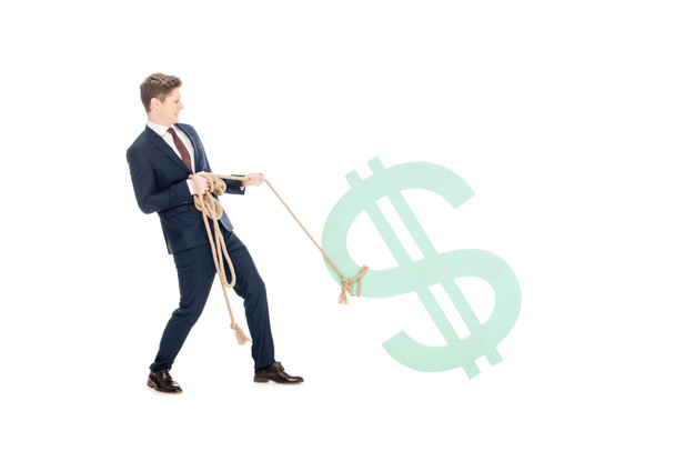Молодой бизнесмен с веревкой тянет большой знак доллара изолирован на белом
 - Фото, изображение
