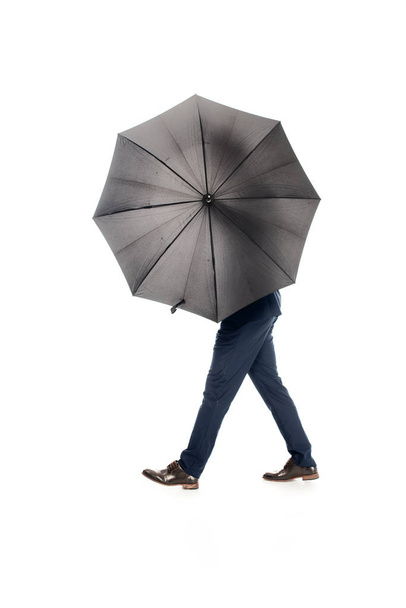 businessman posing with black umbrella isolated on white - Photo, Image