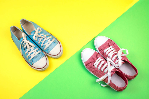 two pairs of sneakers on colorful background  - Zdjęcie, obraz