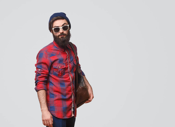 Fashionable hipster man with bag  - Photo, Image