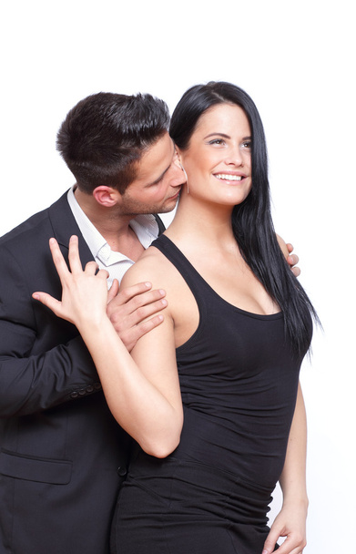 Happy lady kissed by a man in suite - Photo, Image