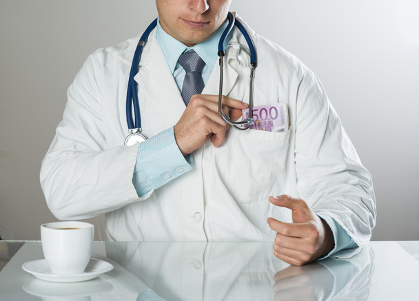 doctor with money - Фото, изображение