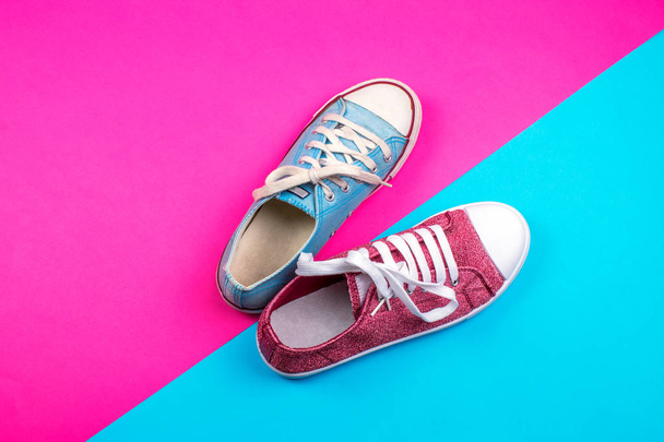 pair of vibrant sneakers on colorful background  - Zdjęcie, obraz