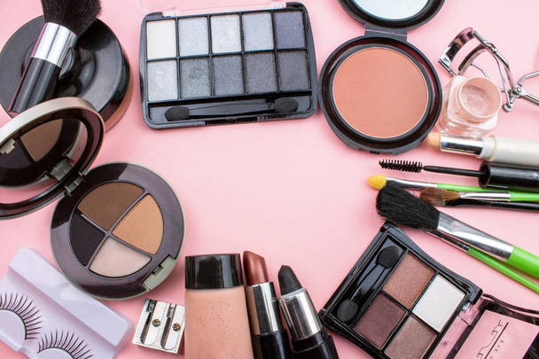Cosmetics and Makeup Composition on Pink Background - Photo, Image