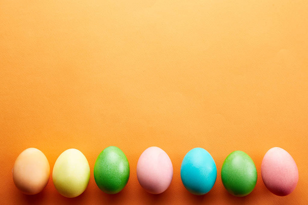 Traditional painted Easter eggs concept. Top view composition. - Fotó, kép