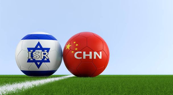Israel vs. China Soccer Match - Soccer balls in Israel and China national colors on a soccer field. Copy space on the right side - 3D Rendering  - Фото, изображение
