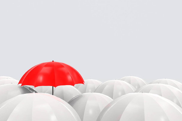3D-Darstellung. Ein roter Regenschirm ist höher als die anderen auf grauem Kopierraum-Hintergrund. Herausragend im Geschäftskonzept. - Foto, Bild