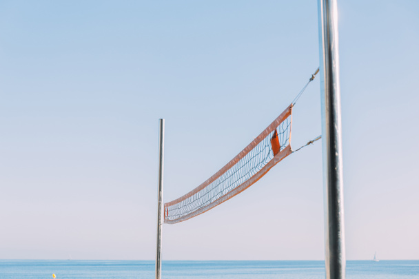 beach volleyball net on blue sky background, barcelona, spain - Fotografie, Obrázek