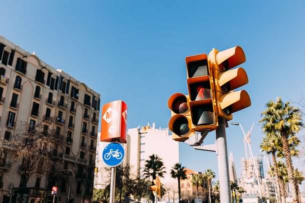urban scene with buildings, traffic light and road sign, barcelona, spain - Photo, Image