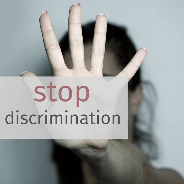 text stop discrimination and woman asking to stop - Photo, Image