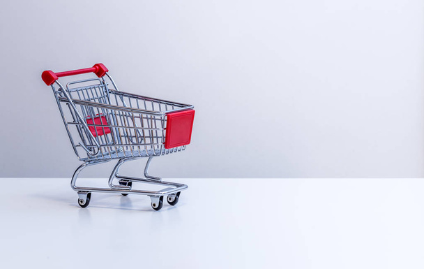 Sale: Shopping cart with copy space, grey  - Fotografie, Obrázek