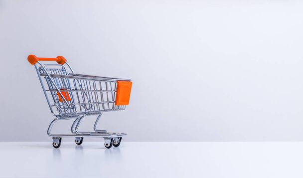 Sale: Shopping cart with copy space, grey  - Foto, immagini