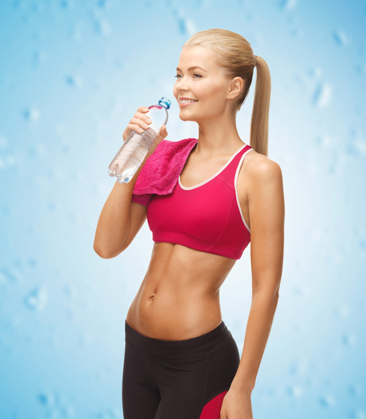 Woman with bottle of water - Photo, Image
