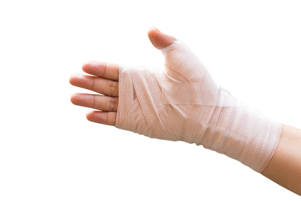 Herido mano femenina envuelto vendaje elástico
 - Foto, imagen