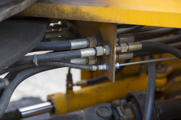 Hydraulický systém hadic a další podrobnosti o žluté silniční stroje - Fotografie, Obrázek
