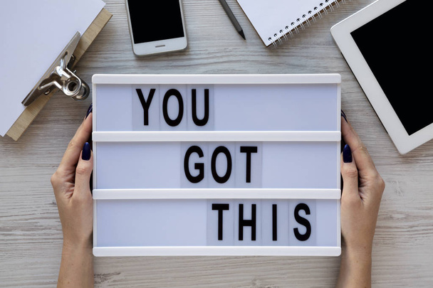 Female hands hold motivation board with text 'You got this'. Fem - Fotó, kép