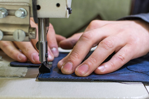professional production sewing machine close-up, leather production, hand seamstress, hand tailor - Foto, Imagem