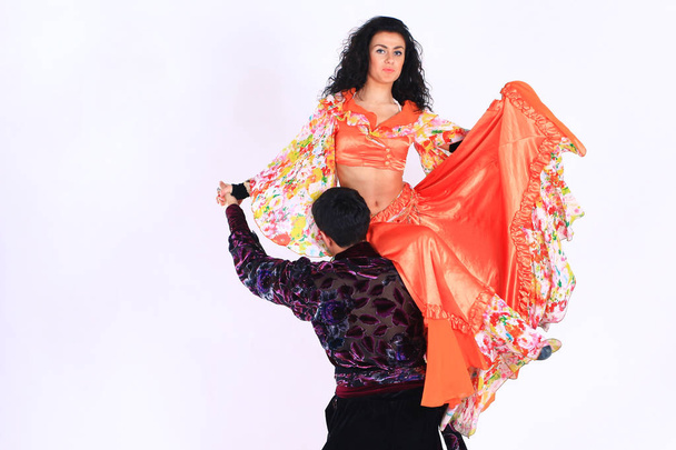 dance couple performing a Gypsy dance .isolated on white. - 写真・画像