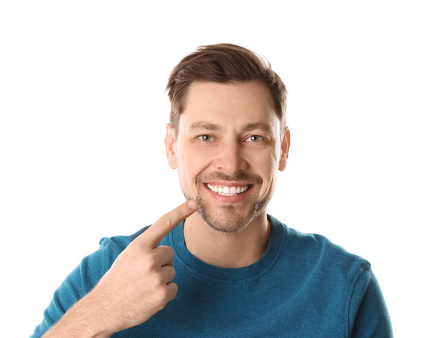 Smiling man with perfect teeth on white background - Foto, imagen