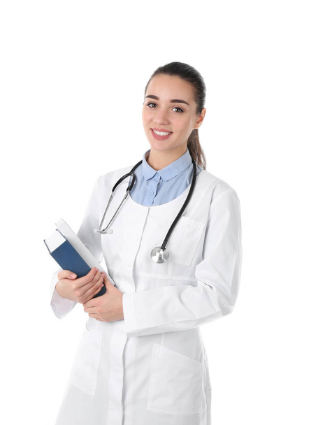 Young medical student with books on white background - Photo, image