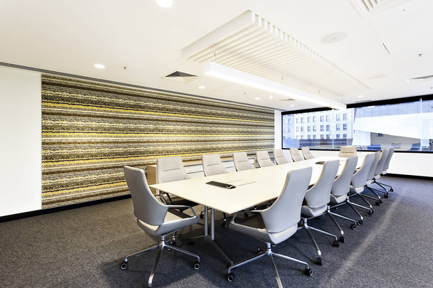 Modern meeting room with chairs and long tables - Photo, Image