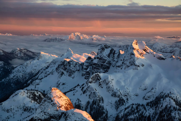 Aerial view of a beautiful Canadian Landscape during a winter sunset. Taken near Squamish, North of Vancouver, British Columbia, Canada. - Zdjęcie, obraz