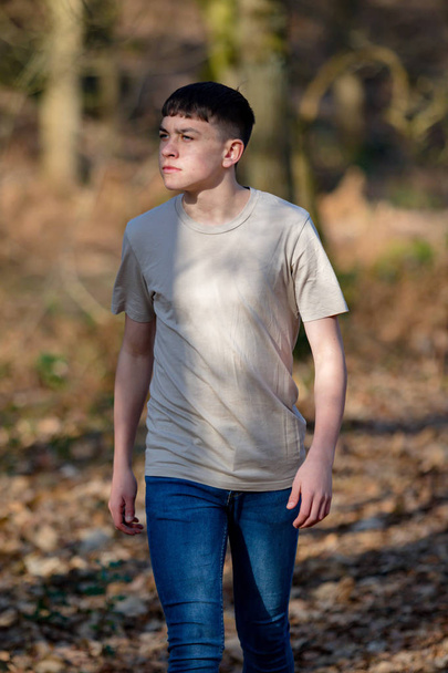 Teenage boy outside on a bright Spring day - Foto, imagen