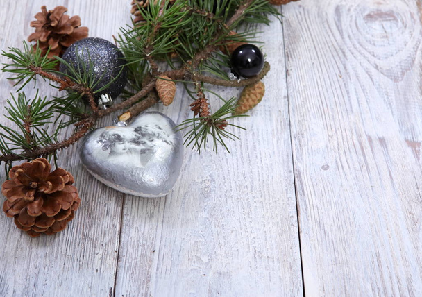 Christmas composition on grey wooden background - Photo, Image