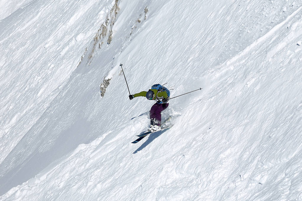 Freestyle ski rider on a very steep slope  - Photo, Image