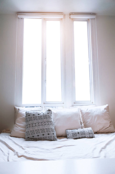 Interior Cozy bedroom in the morning and pillow - Fotoğraf, Görsel