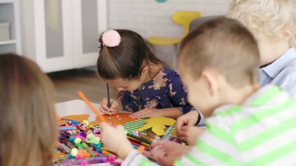 Children preparing decorations for Easter  - Footage, Video
