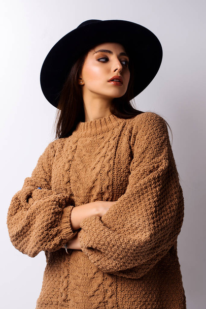 sexy young beautiful brunette woman posing in hat   - Zdjęcie, obraz