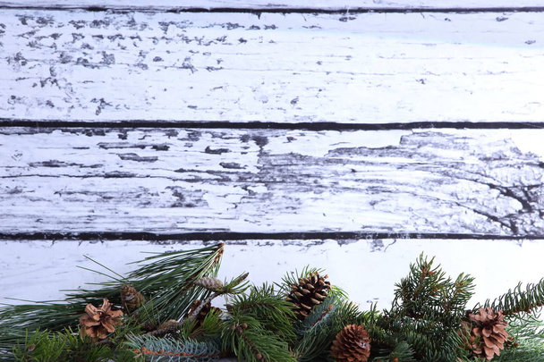 Christmas composition on grey wooden background - Photo, Image
