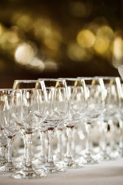 Glasses for wine and champagne at a buffet table - Фото, изображение