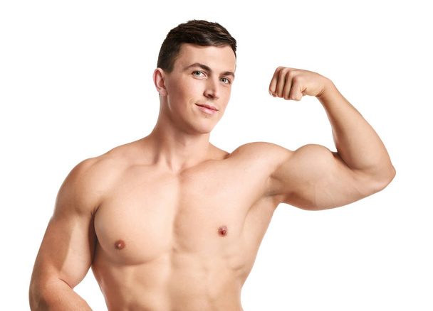 Muscular bodybuilder on white background - Foto, imagen
