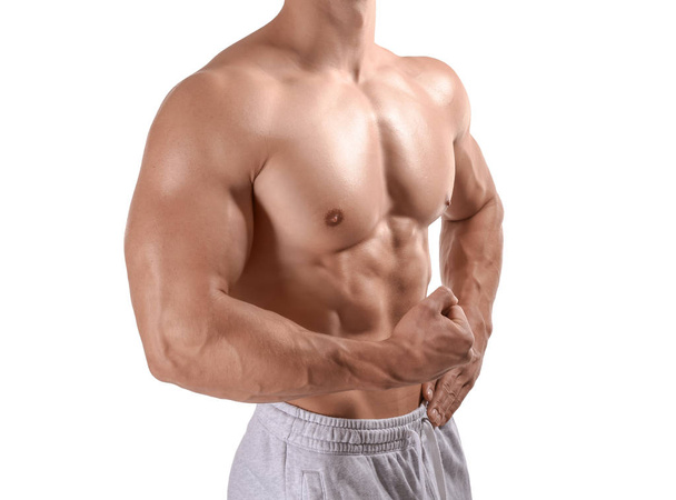 Muscular fisiculturista no fundo branco
 - Foto, Imagem