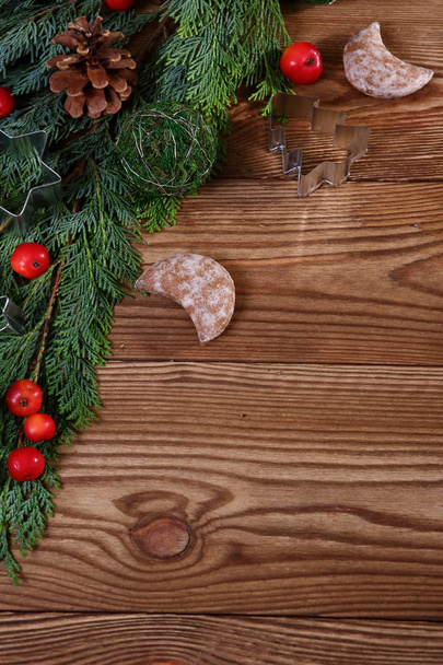 Christmas vintage composition with homemade cookies on brown wooden background - Photo, Image