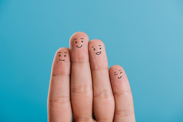 cropped view of happy fingers family isolated on blue - Zdjęcie, obraz