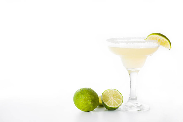 Margarita cocktail with lime in glass isolated on white background. Copyspace - Foto, Imagem
