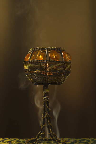 Candle holder in smoke. - Photo, Image