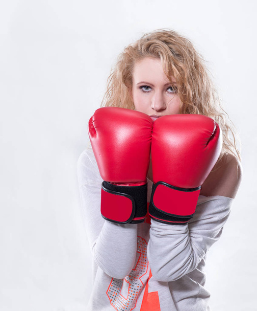 modern young woman in red Boxing gloves - Fotoğraf, Görsel