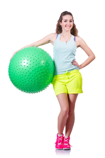 Young woman with ball exercising on white - Foto, Bild